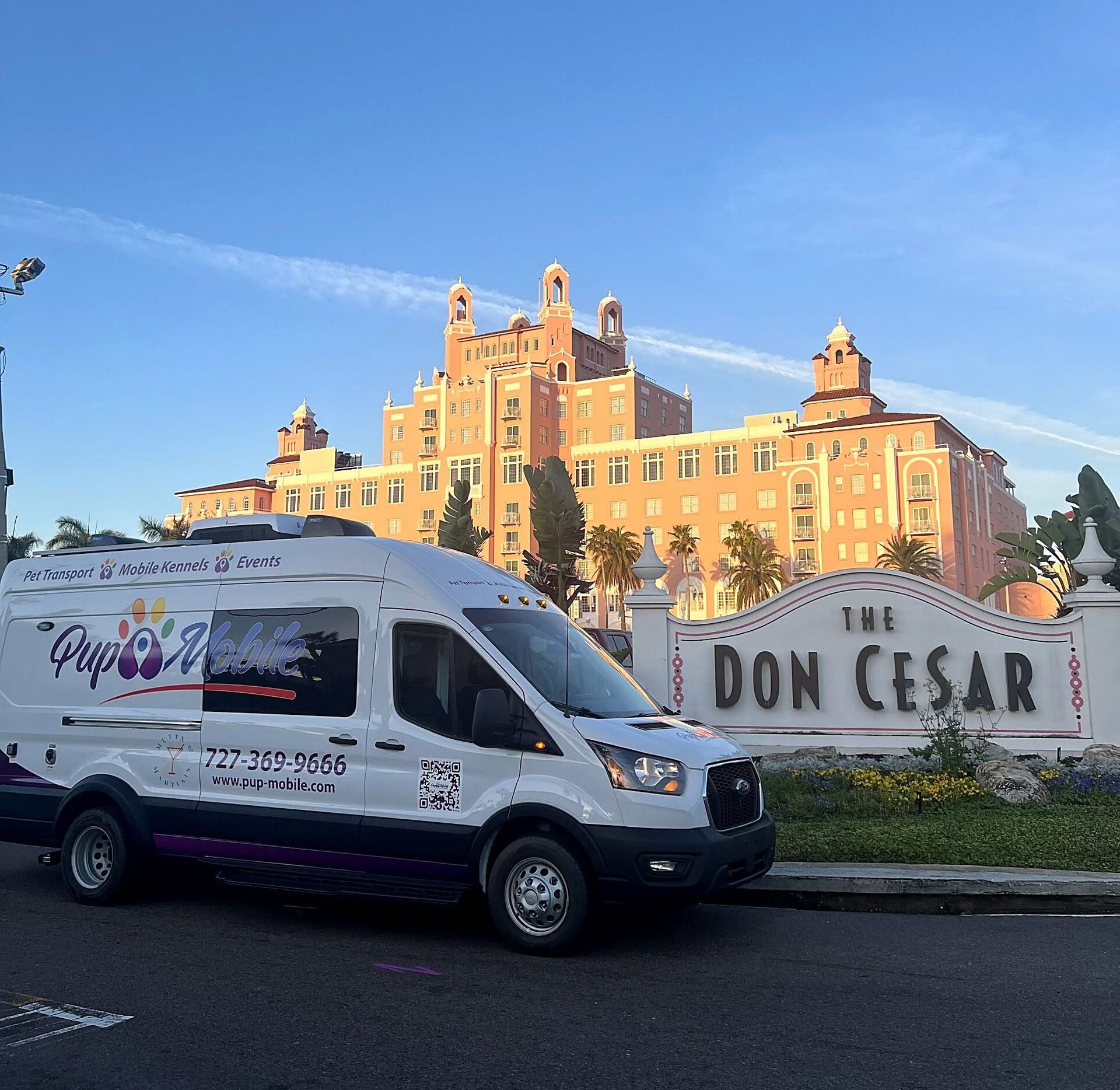 The Pup Mobile kennel van parked at the Don CeSar in St. Pete Beach at golden hour